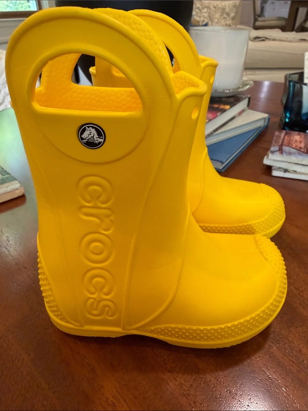 Crocs Kids' Handle It Rain Boots in vibrant yellow. Size 8